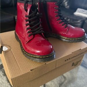 Little girl’s Dr. AirWair Martens, sz 11, bright red/glittery soles.